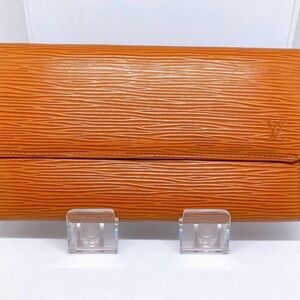 Louis Vuitton Textured Orange Wristlet